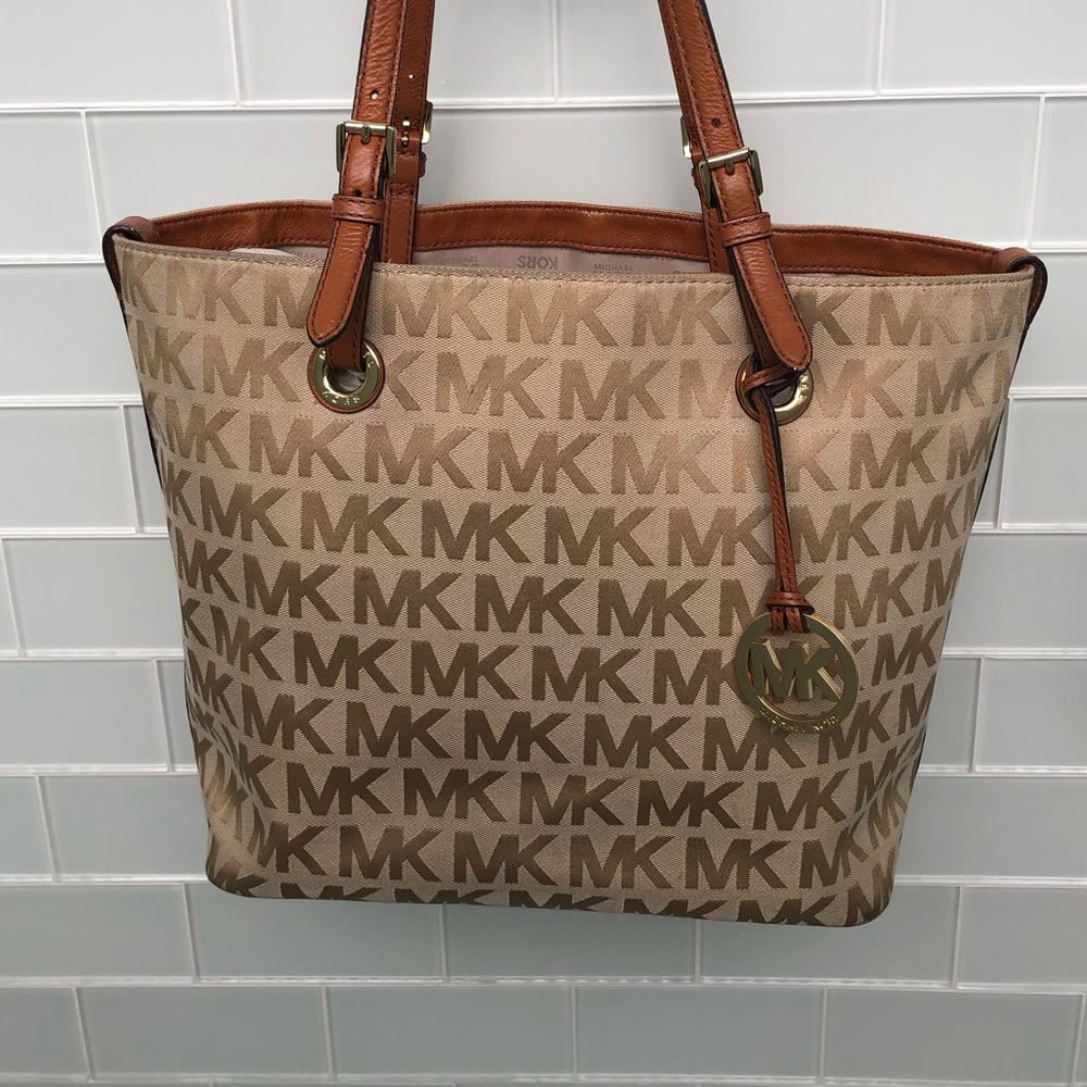 Michael Kors large bag with gold hanging logo & leather straps